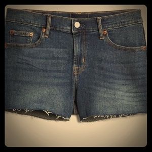 Mid Rise 5" Distressed Denim Shorts